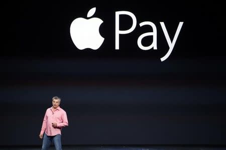 Eddy Cue, Apple's senior vice president of Internet Software and Service, introduces Apple Pay during an Apple event at the Flint Center in Cupertino, California, September 9, 2014. REUTERS/Stephen Lam