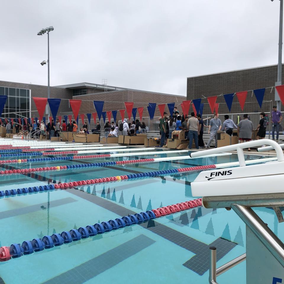 All the teams lined up at the side of the pool before the race. Photo courtesy of Tyler ISD.