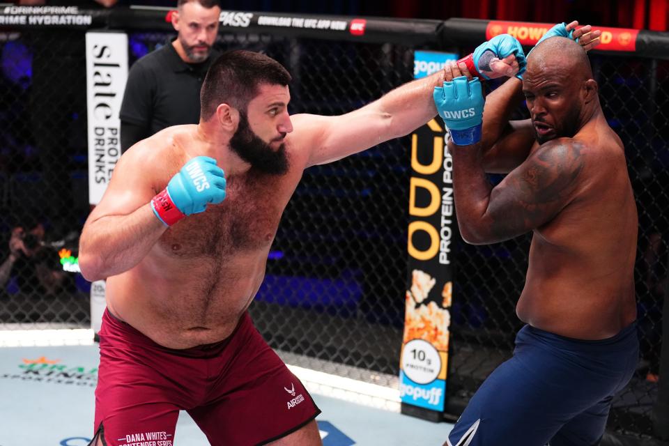 LAS VEGAS, NEVADA - AUGUST 20: (L-R) Rizvan Kuniev of Russia punches Hugo Cunha of Brazil in a heavyweight fight during Dana White's Contender Series, season eight week two on August 20, 2024 in Las Vegas, Nevada. (Photo by Chris Unger/Zuffa LLC)