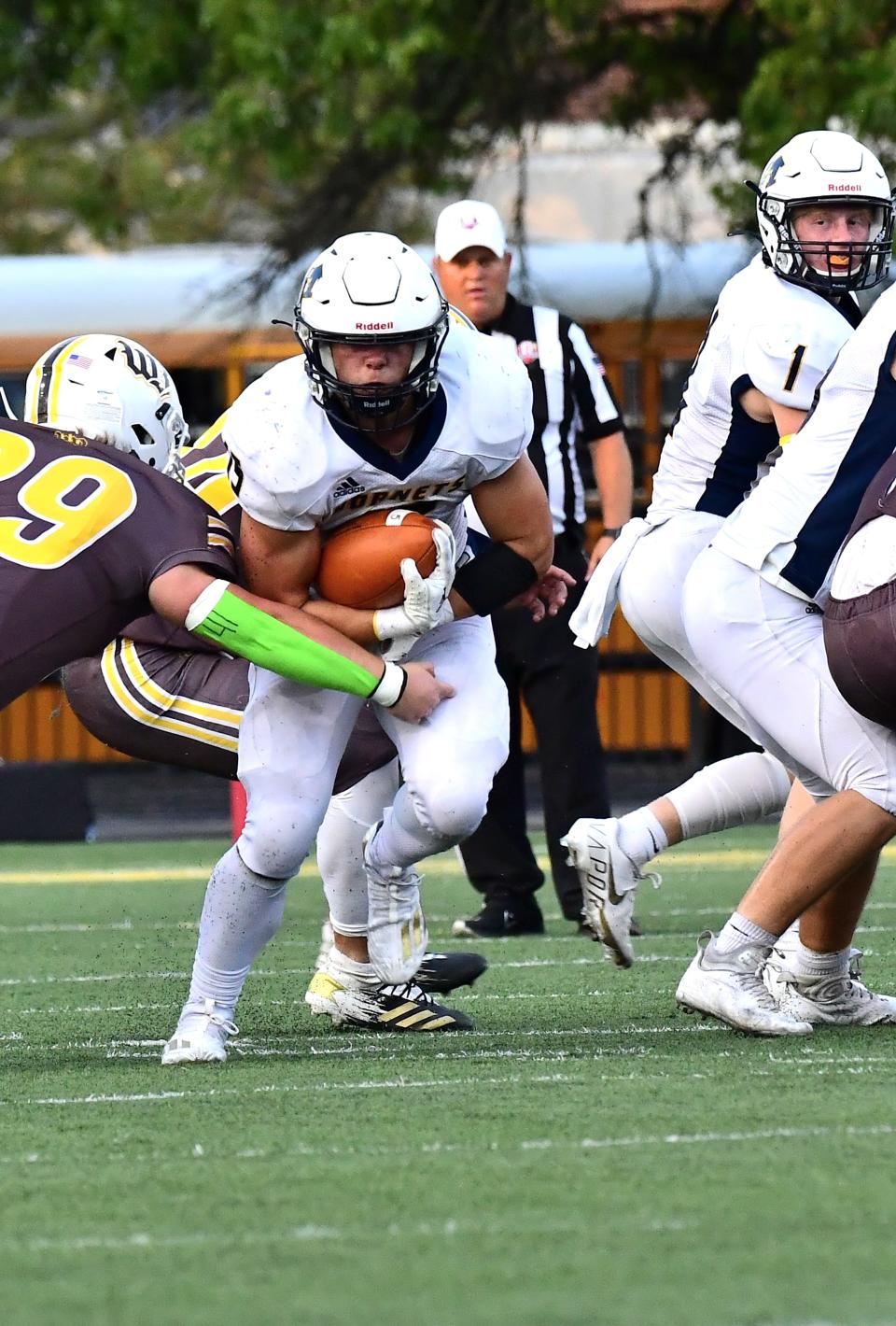 Monroe's Elijah Jackson (15) heads upfield for yards after the catch for the Hornets at the Monroe vs. Western Brown football game Friday, Sept. 2, 2022.