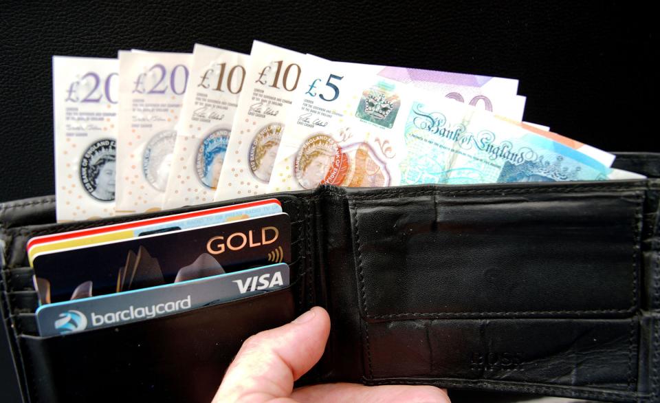 File photo dated 23/06/23 of money in a wallet as the state pension and a raft of benefits will rise on Monday. People receiving the state pension will get a 8.5% increase worth an extra £900 a year to full rate claimants. Universal credit claimants will receive a 6.7% increase, a rise which extends to other benefits including the personal independence payment, disability living allowance and employment and support allowance. Issue date: Monday April 8, 2024.