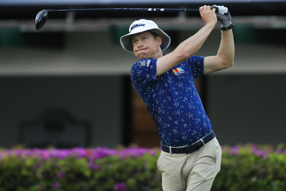 Peter Malnati follows his shot from the 10th tee box during the first round of the Sony Open golf tournament Thursday, Jan. 14, 2021, at Waialae Country Club in Honolulu. (AP Photo/Jamm Aquino)