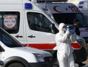 A Police forensic expert works on the scene of an explosion in central Istanbul, Turkey January 12, 2016. REUTERS/Osman Orsal