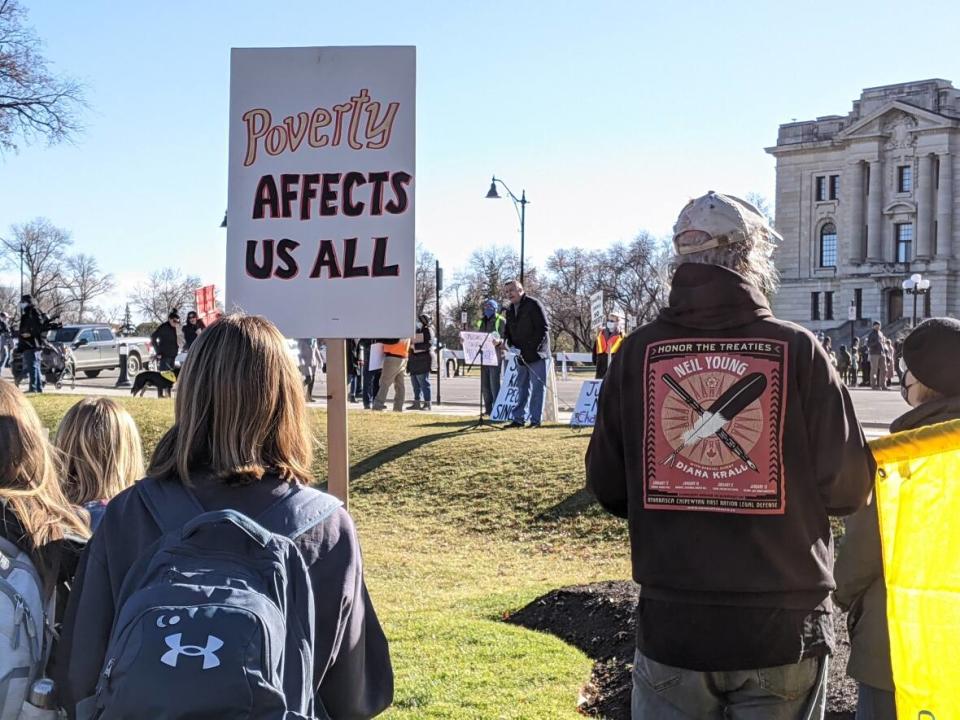 Rallies were held in Regina and Saskatoon on Wednesday to demand changes to the Saskatchewan Income Support (SIS) program. (Dayne Patterson/CBC - image credit)