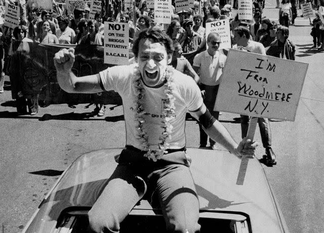 <p>Terry Schmitt/San Francisco Chronicle/Getty</p> Harvey Milk at the Gay Pride Parade in San Francisco on June 23, 1978.