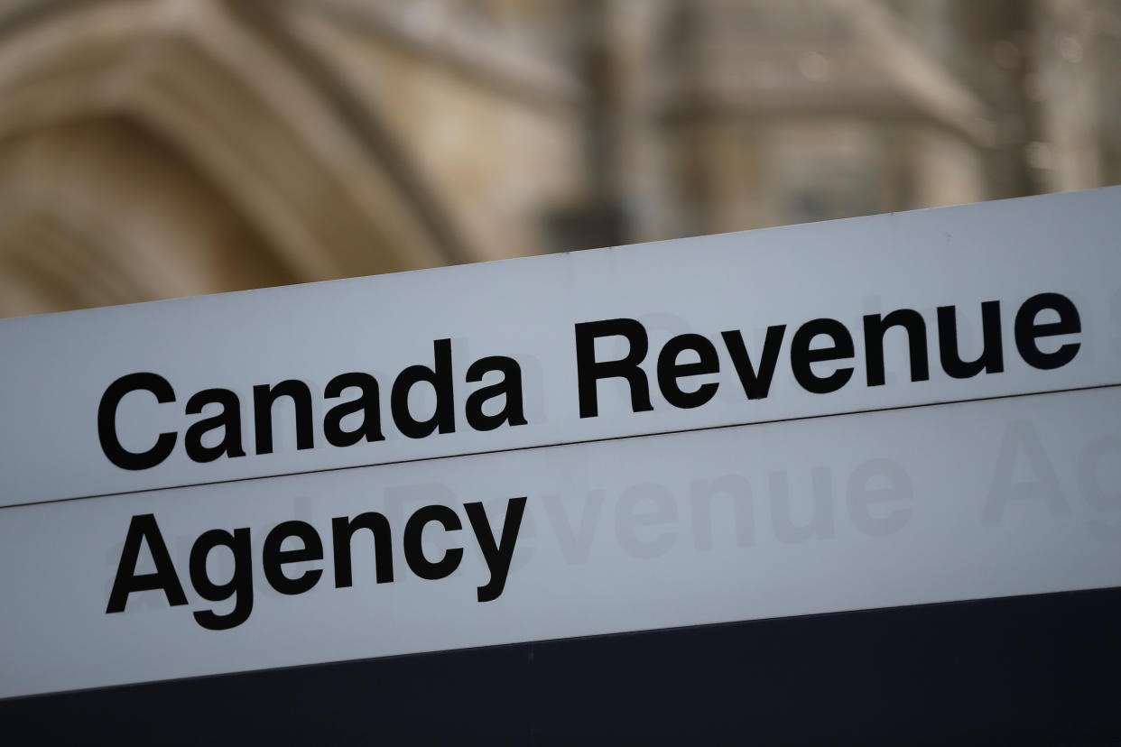 A sign is pictured in front of the Canada Revenue Agency (CRA) national headquarters in Ottawa, Ontario, Canada March 13, 2017. REUTERS/Chris Wattie