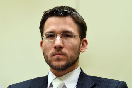 Mathias Grasel, lawyer of defendant Beate Zschaepe, waits prior to the continuation of her trial at a courtroom in Munich, southern Germany, on July 3, 2018. Christof Stache/Pool via Reuters