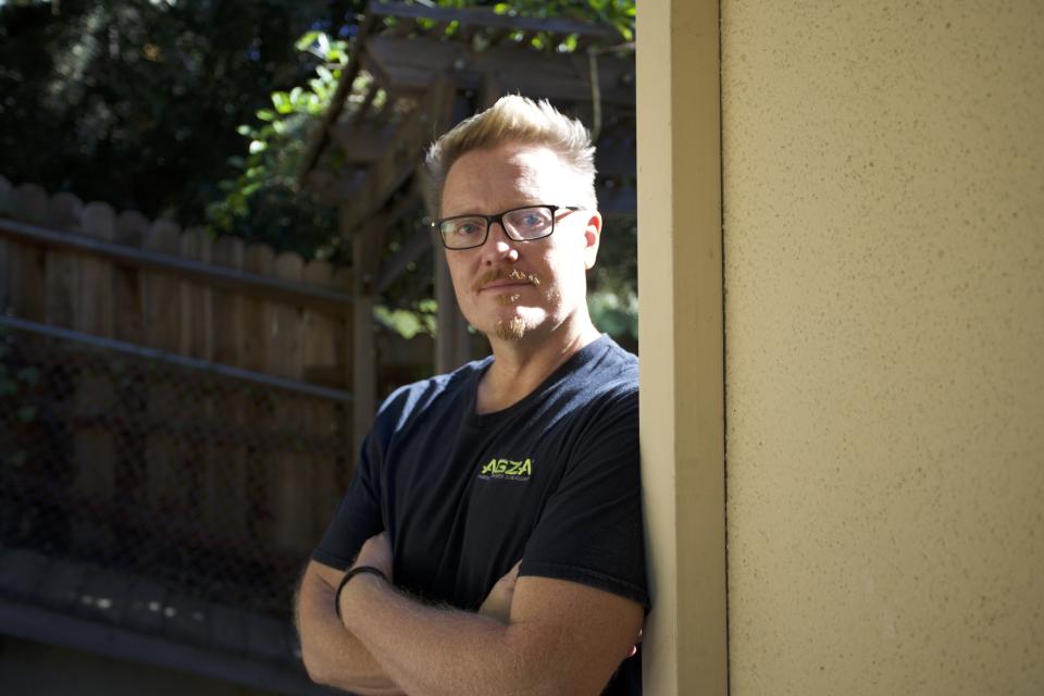 Luke Massman-Johnson outside his Los Angeles home. Massman-Johnson gave up his career and radically changed his lifestyle because of anxiety over climate change. (Photo: Adam Ianniello)