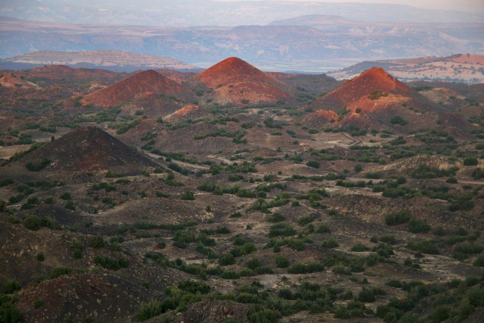 Extinct volcano cones are pictured by drone in Kula-Salihli Geopark, Manisa, Turkey. (Anadolu Agency via Getty Images)