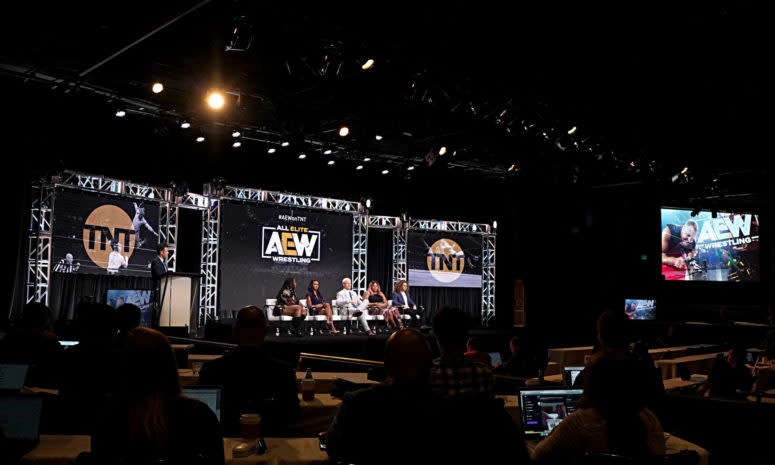 AEW TNT stage with wrestling stars.