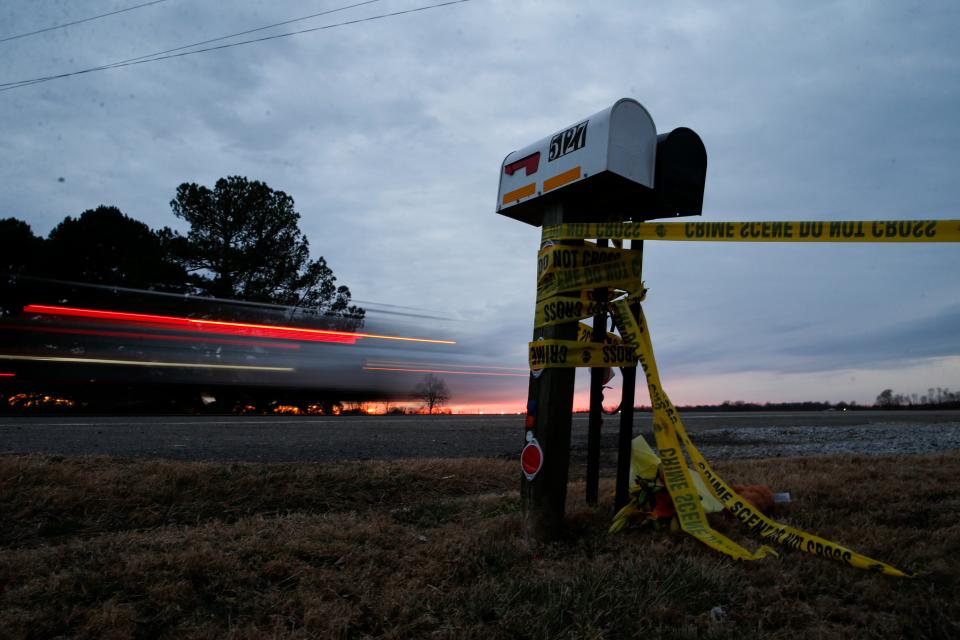 Mailboxes wrapped in police tape stand outside Savanna Puckett's home on Monday.