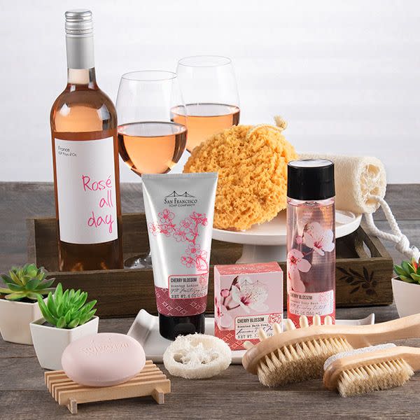 <p><strong>Gourmet Gift Baskets</strong></p><p>gourmetgiftbaskets.com</p><p><strong>$109.99</strong></p><p><a href="https://go.redirectingat.com?id=74968X1596630&url=https%3A%2F%2Fwww.gourmetgiftbaskets.com%2FSpa-Gift-Basket-For-Women.asp&sref=https%3A%2F%2Fwww.goodhousekeeping.com%2Fholidays%2Fgift-ideas%2Fg34054234%2Fbest-gift-baskets-for-women%2F" rel="nofollow noopener" target="_blank" data-ylk="slk:Shop Now;elm:context_link;itc:0;sec:content-canvas" class="link ">Shop Now</a></p><p>If she could use a relaxing night in, set her up with this gift basket that's complete with rosé, a loofah, body wash, and other bath products. </p>