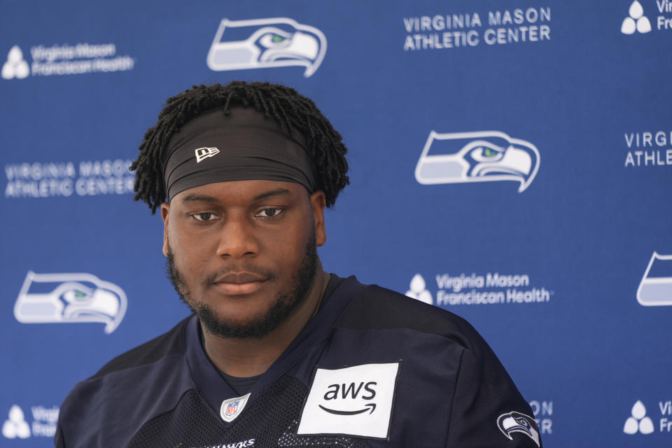 Seattle Seahawks guard Christian Haynes listens to questions from the media after participating in the NFL football team's rookie minicamp Friday, May 3, 2024, in Renton, Wash. (AP Photo/Lindsey Wasson)