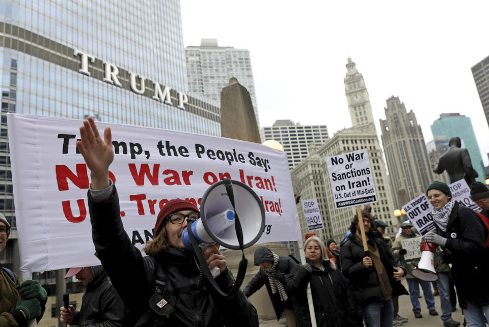 Activists gather near Chicago's Trump Tower to protest recent U.S. military actions in Iraq on Saturday, Jan. 4, 2020, in Chicago. A top Iranian general and Iraqi militiamen were killed in a U.S. airstrike that sharply escalated tensions across the region. (Abel Uribe//Chicago Tribune via AP)