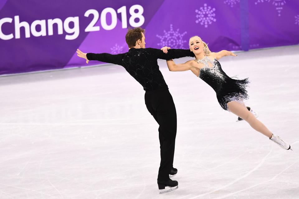 <p>Britain’s Penny Coomes and Britain’s Nicholas Buckland compete in the ice dance short dance of the figure skating event during the Pyeongchang 2018 Winter Olympic Games at the Gangneung Ice Arena in Gangneung on February 19, 2018. / AFP PHOTO / ARIS MESSINIS </p>