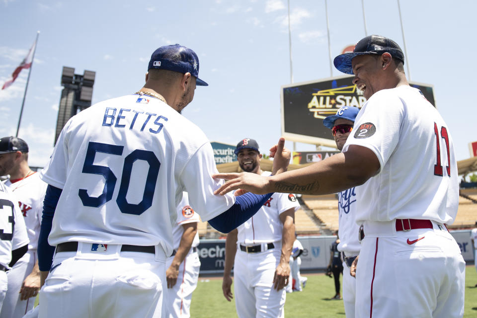 Dodgers star Mookie Betts talks with former teammate Rafael Devers prior to the 2022 All-Star Game in Los Angeles. (Photo by Maddie Malhotra/Boston Red Sox/Getty Images)