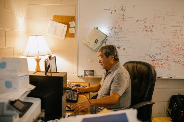 Louisiana State University professor Yi-Jun Xu, pictured in his office in Baton Rouge on April 19, is an expert on Atchafalaya Basin water flows. He worries what would happen if massive sediment buildups in the Mississippi River were dislodged by a major hurricane. (Photo: Bryan Tarnowski for HuffPost)