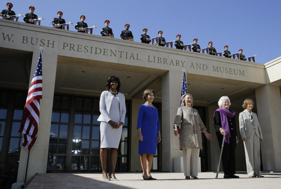 From left, First Lady Michelle Obama, former first lady Laura Bush, former first lady Hillary Clinton, former first lady Barbara Bush, former first lady Rosalynn Carter arrive for the dedication of the George W. Bush presidential library on Thursday, April 25, 2013, in Dallas. (AP Photo/David J. Phillip)