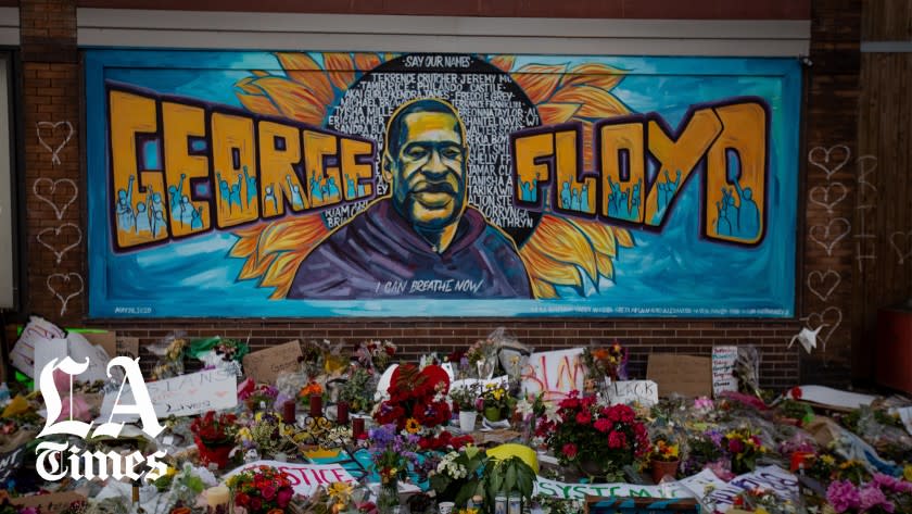 MINNEAPOLIS , MINNESOTA - MAY 31: The makeshift memorial and mural outside Cup Foods where George Floyd was murdered by a Minneapolis police officer on Sunday, May 31, 2020 in Minneapolis , Minnesota. (Jason Armond / Los Angeles Times)