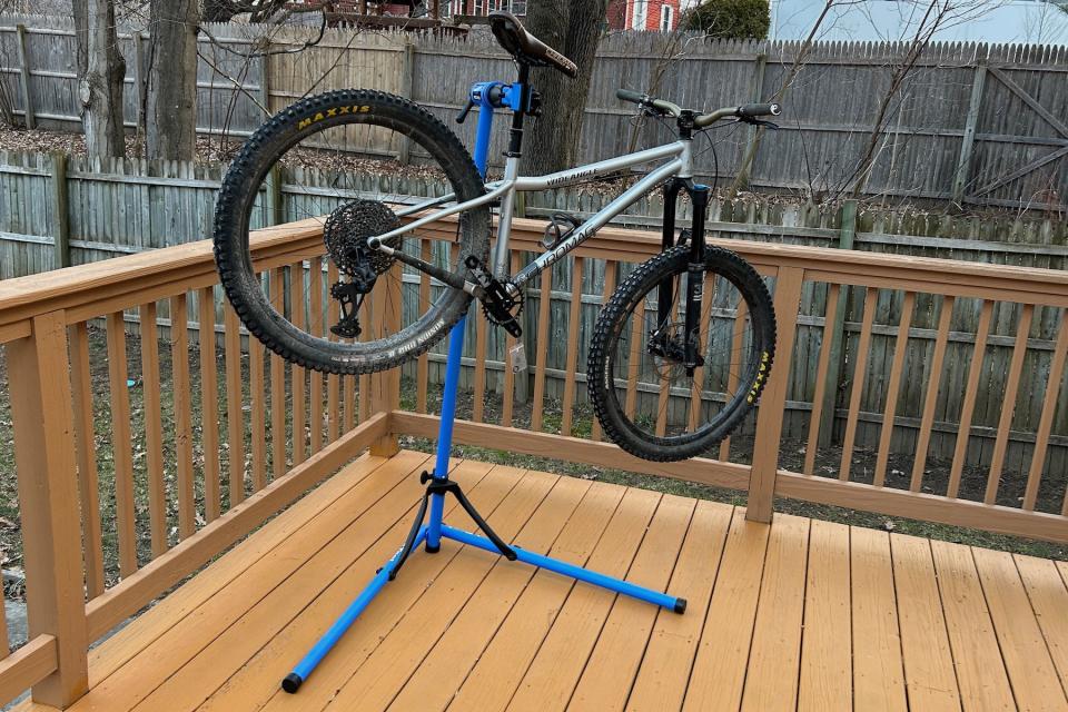 A hardtail mounting bike held up in the Park Tool PCS-10.3 bike repair stand