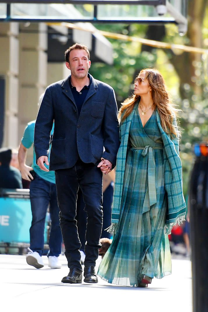 Jennifer Lopez and Ben Affleck head out for a walk in Madison Square Park in New York, Sept. 26. - Credit: MEGA