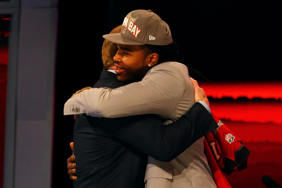 NEW YORK, NY - APRIL 26: Mark Barron of Alabama greets NFL Commissioner Roger Goodell after he was selected #7 overall by the Tampa Bay Buccaneers in the first round of during the 2012 NFL Draft at Radio City Music Hall on April 26, 2012 in New York City. (Photo by Al Bello/Getty Images)