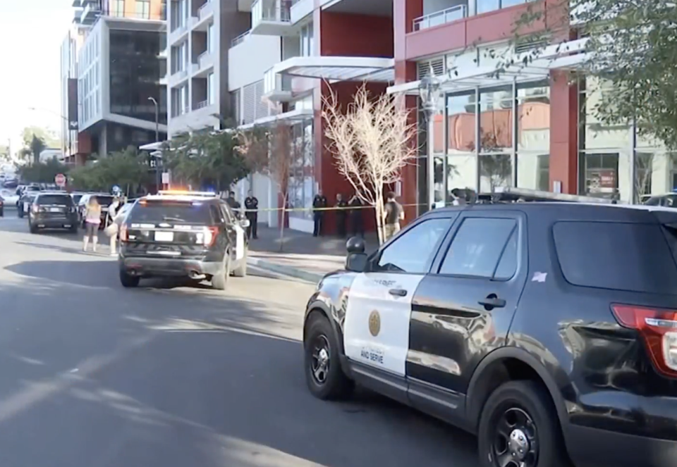 Police outside the high-rise where the alleged murders occurred. Source: ABC 7