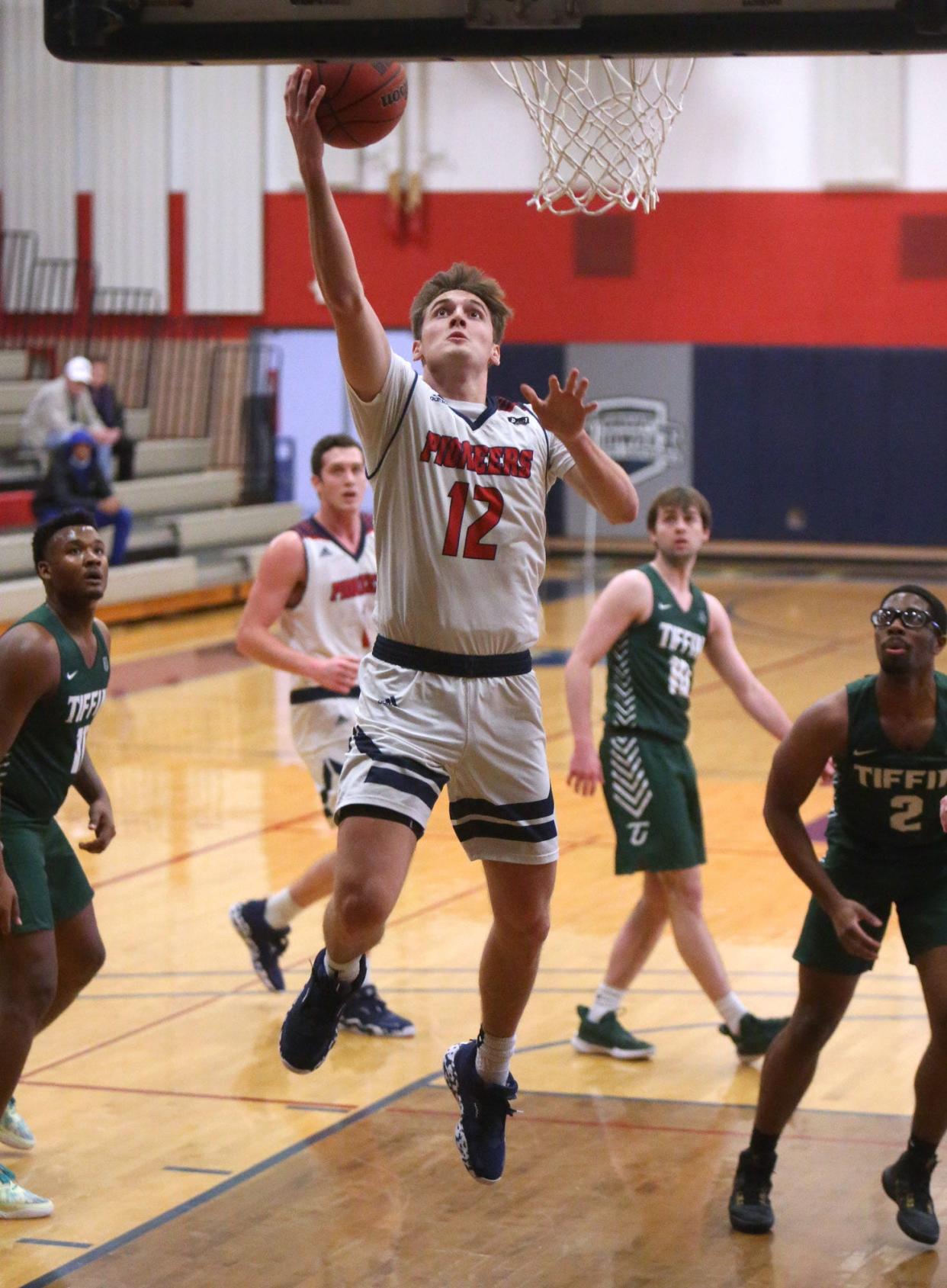 Bo Myers, 12, of Malone, goes to the basket during their game against Tiffin at Malone on Monday, Jan. 3, 2022.
