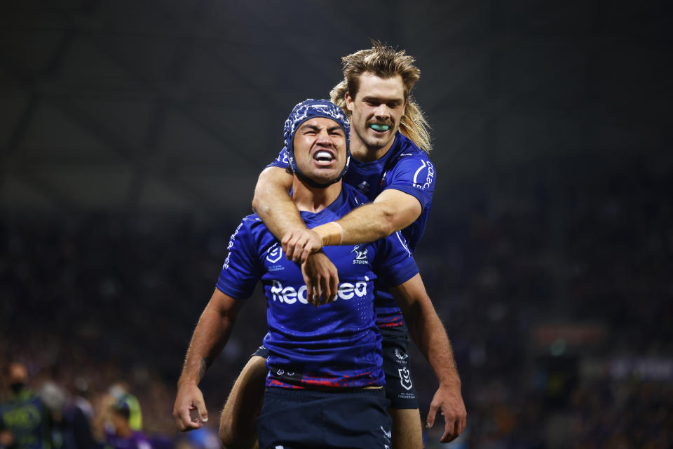 Jahrome Hughes, pictured here celebrating a try with Ryan Papenhuyzen during Melbourne's win over the Warriors.