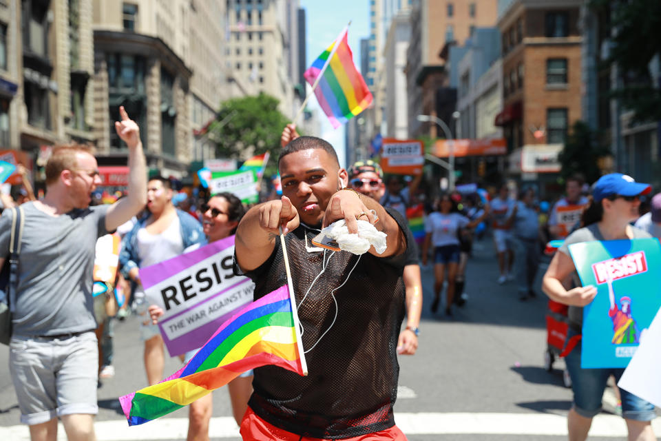 <p>A young man shows love for the camera as he marches down Fifth Avenue in N.Y.C. Pride Parade in New York on June 25, 2017. (Photo: Gordon Donovan/Yahoo News) </p>