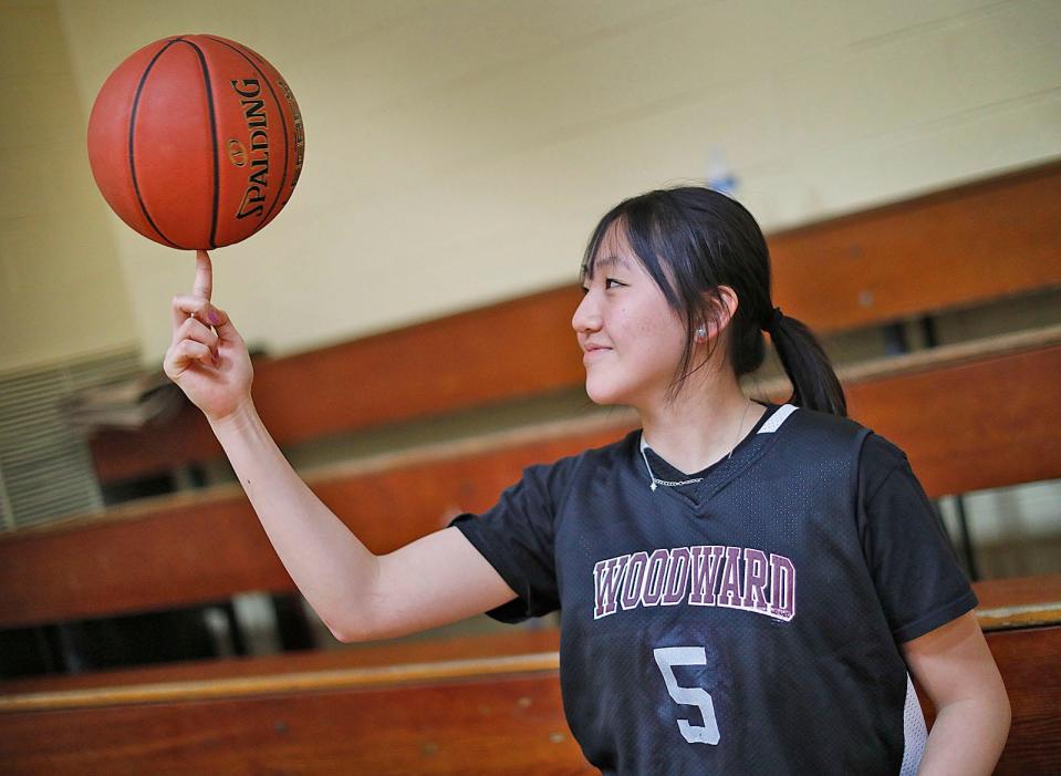 Nicole Leung, 17, is a star point guard at The Woodward School.