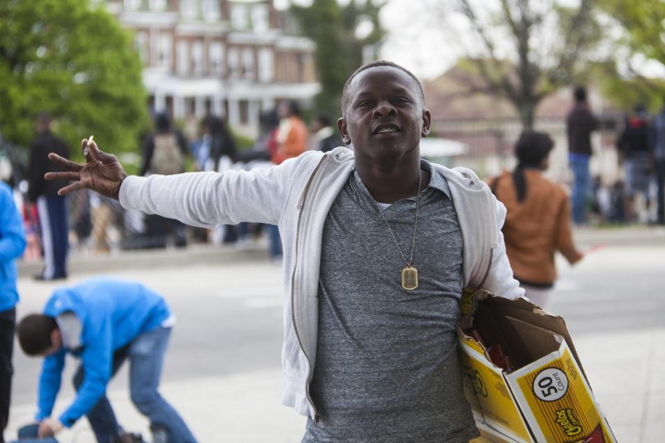 A protestor during riots in Baltimore, USA on April 27, 2015. Protests following the death of Freddie Gray from injuries suffered while in police custody have turned violent with people throwing debris at police and media and burning cars and businesses. (Photo by Samuel Corum/Anadolu Agency/Getty Images)