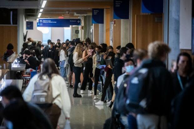 Voters, mostly students, wait in line to cast their ballot at the only polling station on campus at the University of British Columbia on Sept. 20.  (Ben Nelms/CBC - image credit)