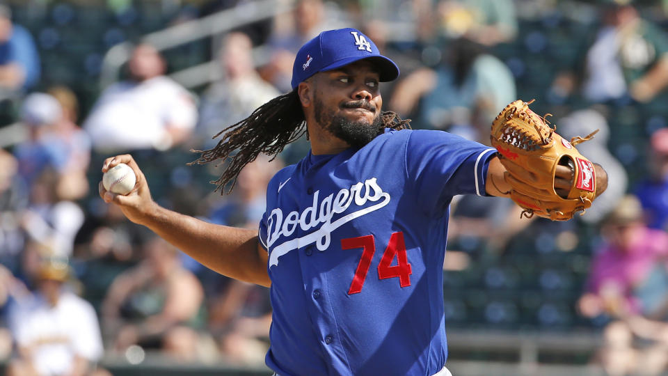 Los Angeles Dodgers' Kenley Jansen (74) pitches during a spring training baseball game, Thursday, March 5, 2020, in Mesa, Ariz. (AP Photo/Sue Ogrocki)