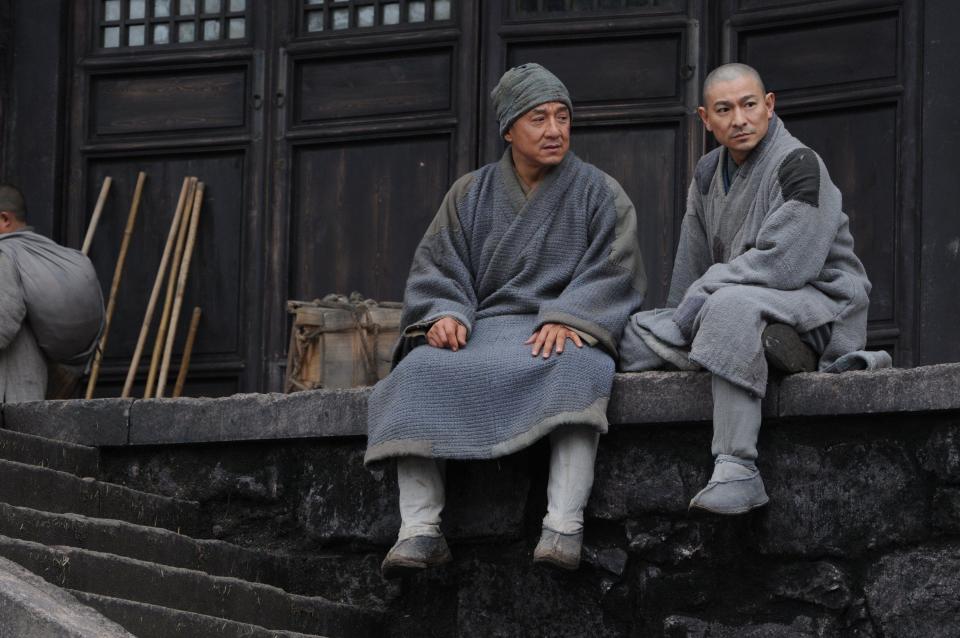 Jackie Chan and Andy Lau's characters sitting together