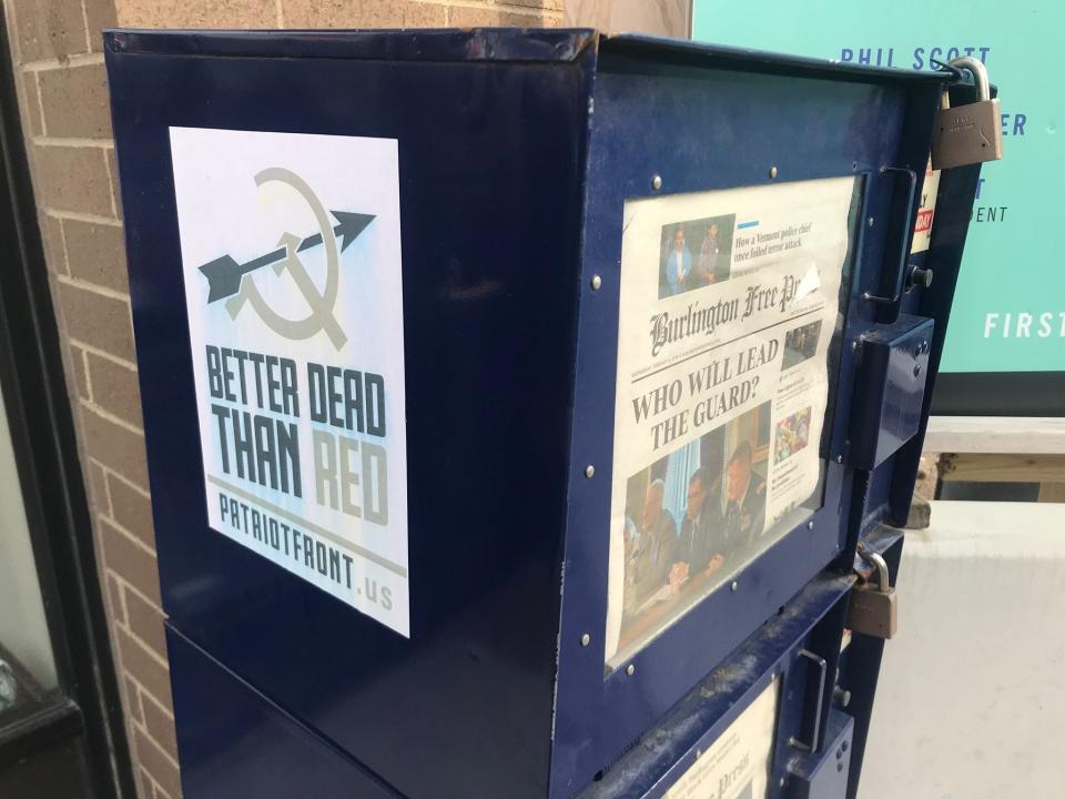A Patriot Front poster was found on the newspaper box outside the Free Press office Feb. 6. Now the group's name is showing up amid vandalism at the University of Vermont.