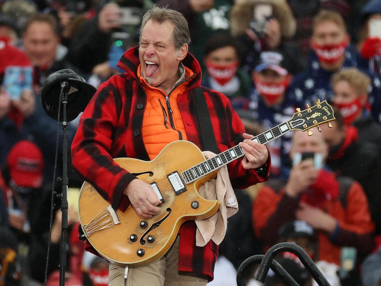 Ted Nugent performs ‘The Star-Spangled Banner’ during a Trump campaign rally in Lansing, Michigan (Ge (Getty)