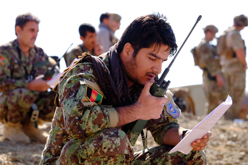 An Afghan Tactical Air Controller practices directing an air strike during an exercise at a range outside Kabul, Afghanistan, October 18, 2016. REUTERS/Josh Smith 