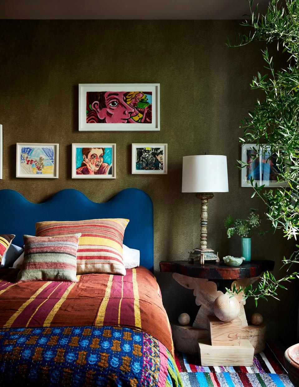 In the main bedroom, a Maharam wool upholsters the headboard; Daniel W. Freeman art, Farrow & Ball ceiling paint, nightstand from Blackman Cruz.