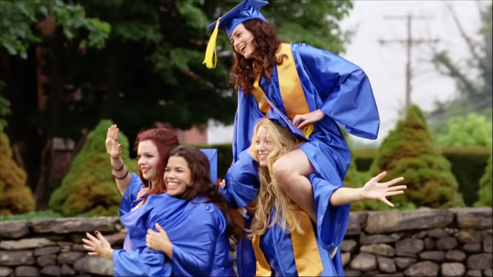 Tibby, Lena, Carmen, and Bridget from "The Sisterhood of The Traveling Pants" are taking graduation pictures together