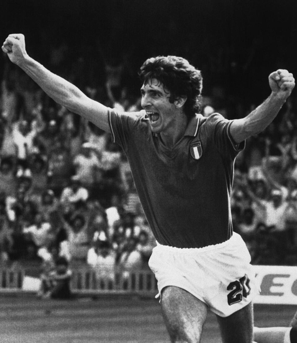 FILE - In this July 8, 1982 file photo, Italy's Paolo Rossi races across the pitch after scoring his team's first goal against Poland during the soccer World Cup Semi-final match between Italy and Poland at the Nou Camp Stadium, Barcelona, Spain. Rossi, the star of Italy’s World Cup-winning team in 1982, has reportedly died at age 64. He was the leading scorer in the '82 World Cup and was also FIFA's player of the year. (AP Photo, File)