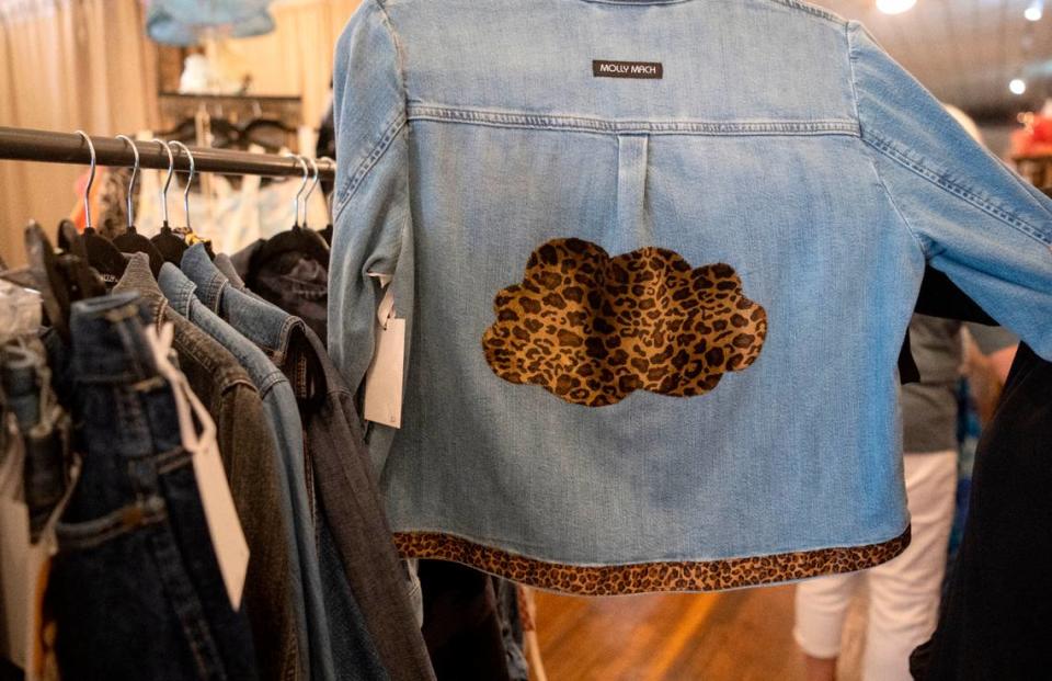 An up-cycled jean jacket featuring a cloud of cheetah print is part of the Molly Mach Collection that will be available at Helen Foxx & Co. on Saturday, July 22, 2023. Molly Marciano loves animal prints and wanted to use it in a cloud design.