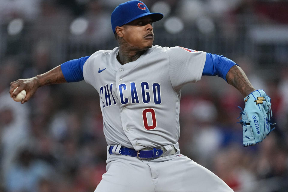 FILE - Chicago Cubs starting pitcher Marcus Stroman delivers in the first inning of a baseball game against the Atlanta Braves, Sept. 28, 2023, in Atlanta. Right-hander Stroman and the New York Yankees agreed Thursday, Jan. 11, 2024, to a $37 million, two-year contract, a person familiar with the negotiations told The Associated Press. The person spoke on condition of anonymity because the deal was subject to a successful physical. (AP Photo/John Bazemore, File)