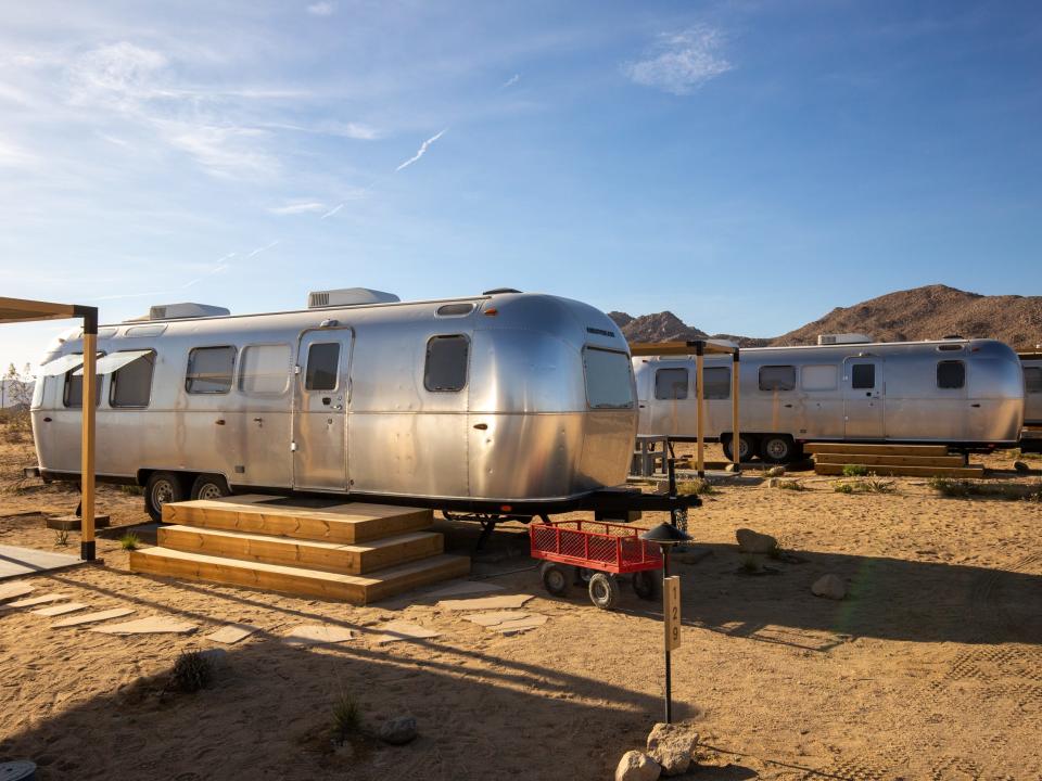 A row of Airstream trailers at Autocamp's Joshua Tree location.