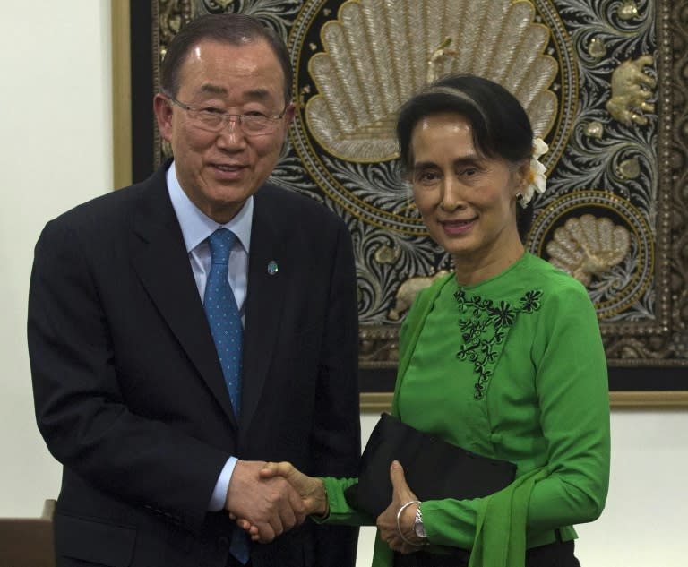 UN Secretary General Ban Ki-moon (L) and Myanmar State Counsellor Aung San Suu Kyi shake meet in Naypyidaw on August 30, 2016, ahead of an ethnic minorities peace conference