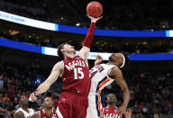 <p>Ivan Aurrecoechea #15 of the New Mexico State Aggies and Anfernee McLemore #24 of the Auburn Tigers battle for the ball during the first half in the first round of the 2019 NCAA Men’s Basketball Tournament at Vivint Smart Home Arena on March 21, 2019 in Salt Lake City, Utah. (Photo by Patrick Smith/Getty Images) </p>