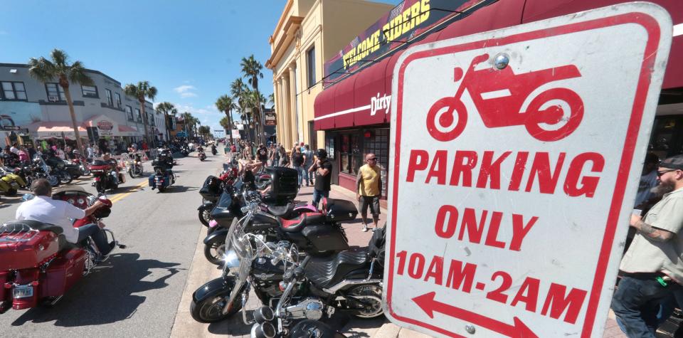 Motorcycles roll along Main Street on Saturday as Biketoberfest shifts into high gear in Daytona Beach. This year's 30th anniversary edition of the four-day event offered a welcome boost to area businesses in the wake of damages and disruptions from Tropical Storm Ian.