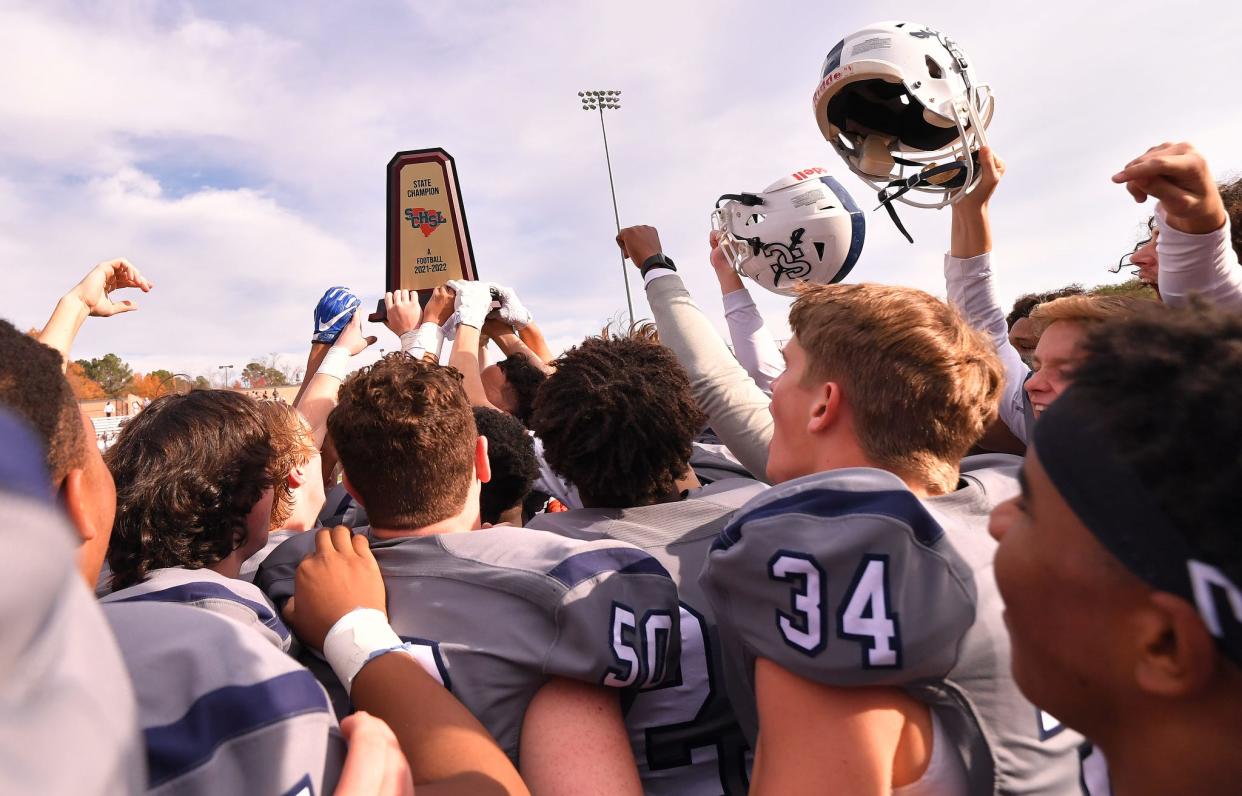 The Southside Christian Sabres take on the Bamberg-Ehrhardt Red Raiders in the SCHSL 1A State Championship football game, held at Benedict College in Columbia, Saturday evening, December 4, 2021. Southside Christian celebrates their state championship win after the game Saturday.