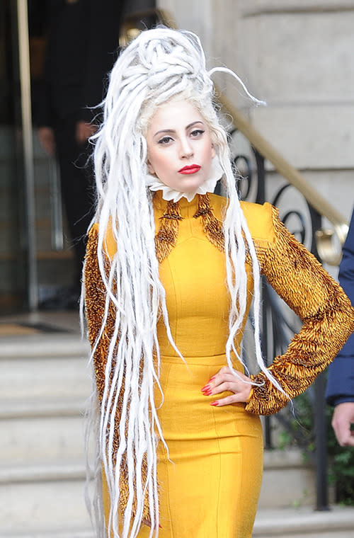 We’re pretty sure this is a wig - bleaching your hair white and then turning it into locs might be too much effort, even for Gaga. As usual, her skin is flawless and her statement lips are shaded red.