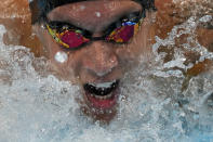 Caeleb Dressel, of the United States, swims in the men's 100-meter butterfly final at the 2020 Summer Olympics, Saturday, July 31, 2021, in Tokyo, Japan. (AP Photo/Gregory Bull)